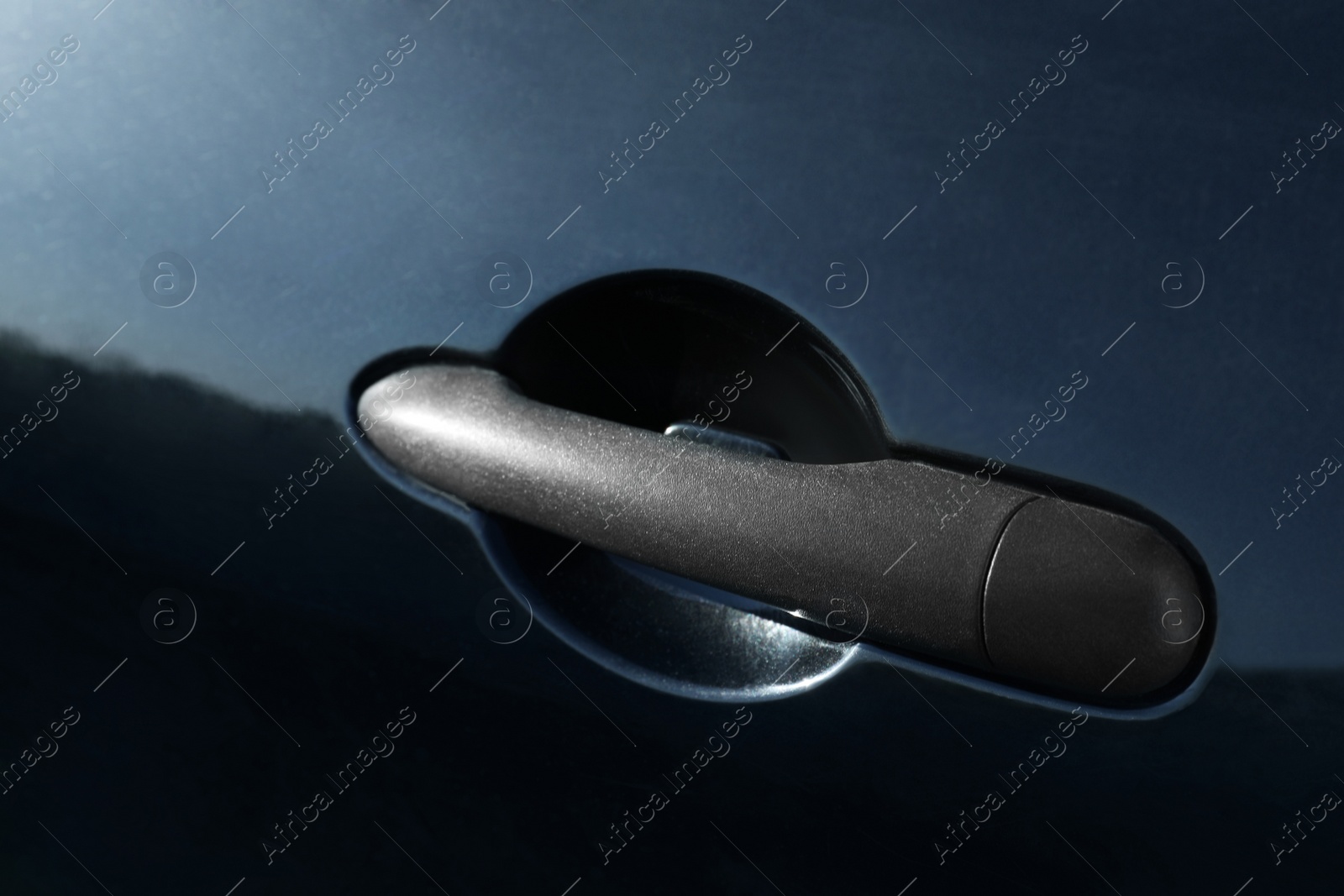 Photo of Car with door handle outdoors, closeup view