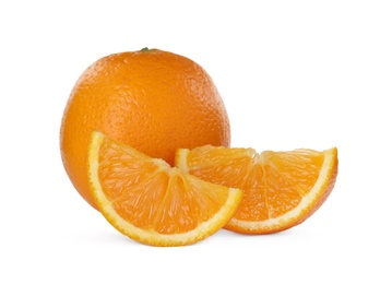 Photo of Cut and whole ripe oranges on white background