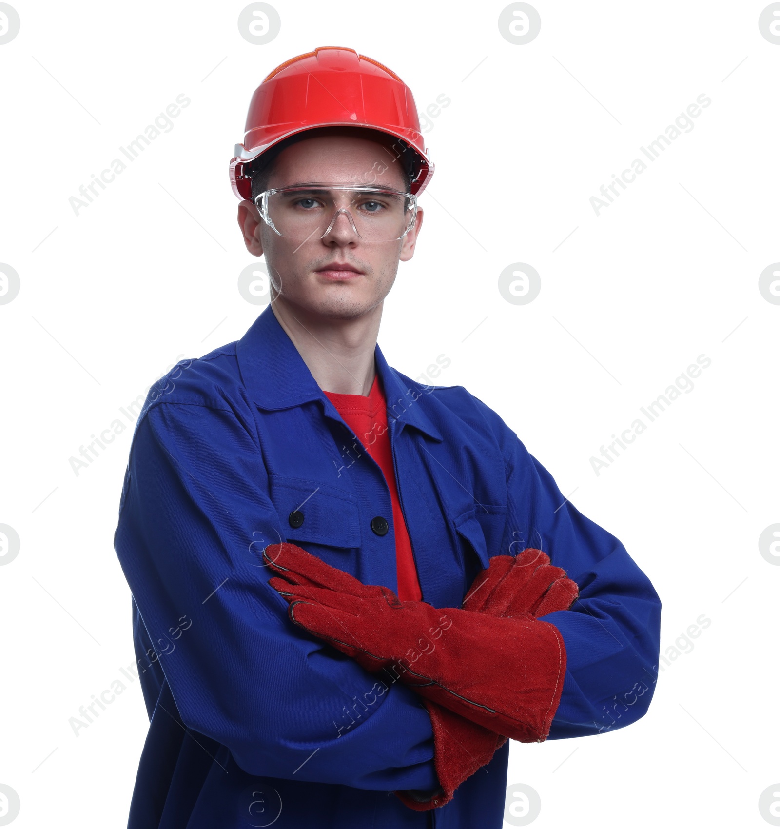 Photo of Young man with crossed arms wearing safety equipment on white background