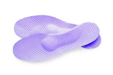 Image of Pair of color orthopedic insoles on white background, top view