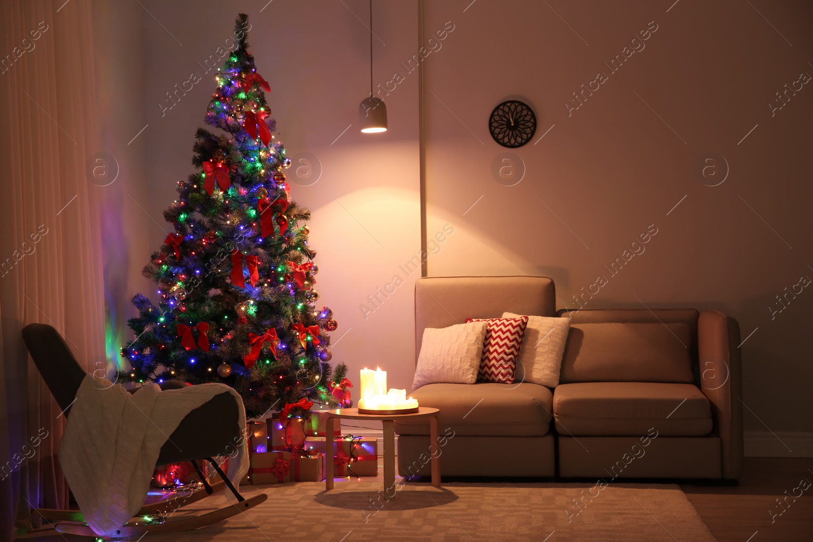 Photo of Stylish room interior with decorated Christmas tree