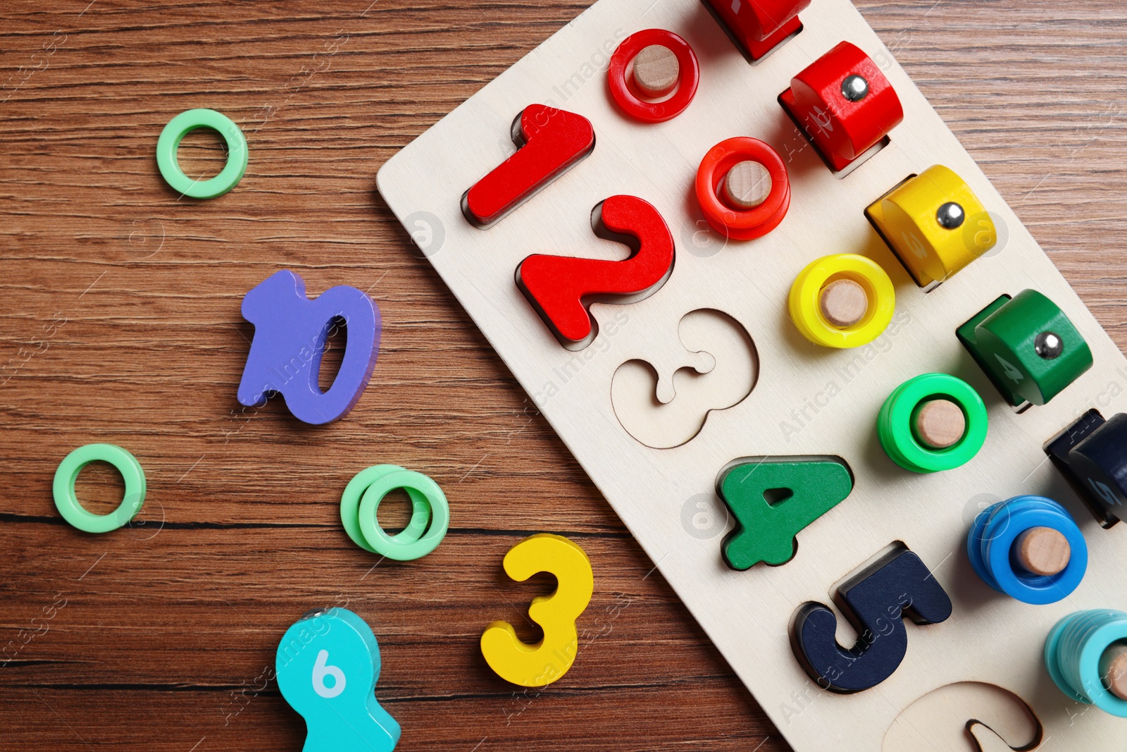 Photo of Math game Fishing for Numbers on wooden table, flat lay