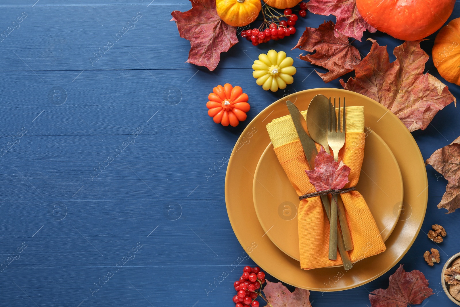 Photo of Thanksgiving day. Beautiful table setting and autumn decoration, flat lay. Space for text