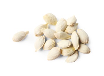 Photo of Many seeds of tangerine isolated on white, top view