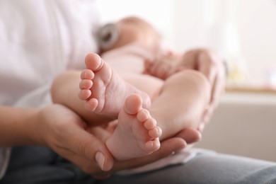 Mother with her cute baby, closeup view