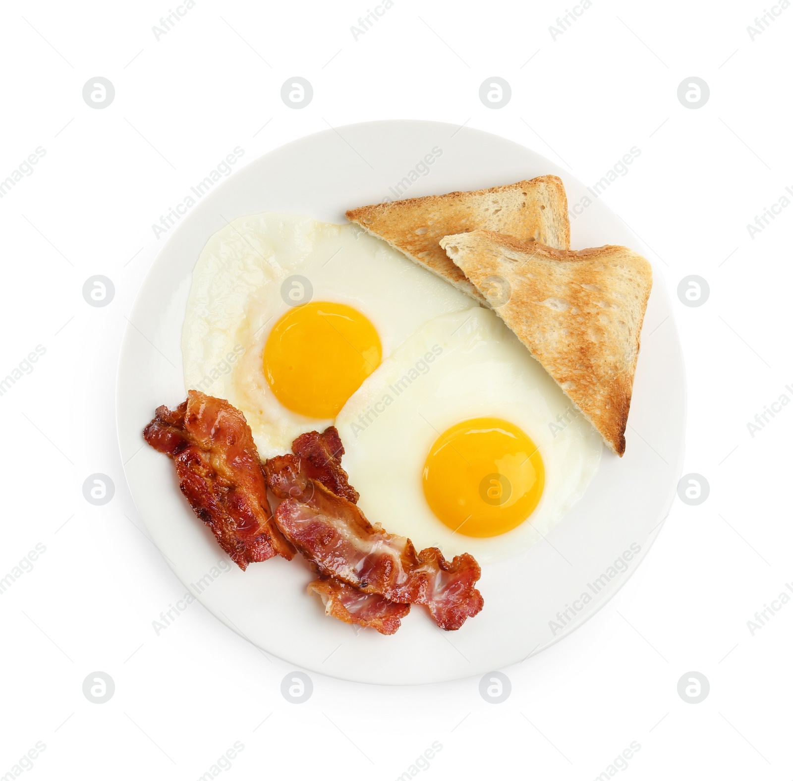 Photo of Delicious breakfast with sunny side up eggs isolated on white, top view