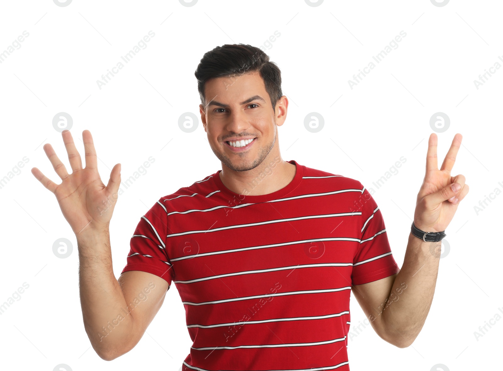 Photo of Man showing number seven with his hands on white background