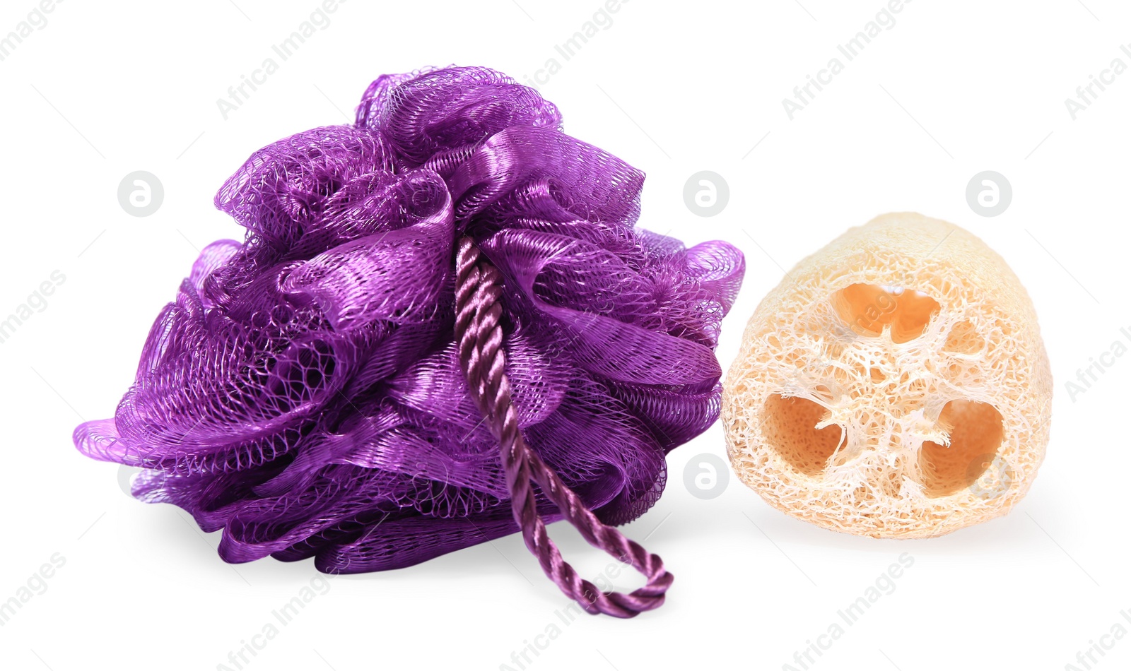 Photo of New shower puff and loofah sponge on white background. Personal hygiene