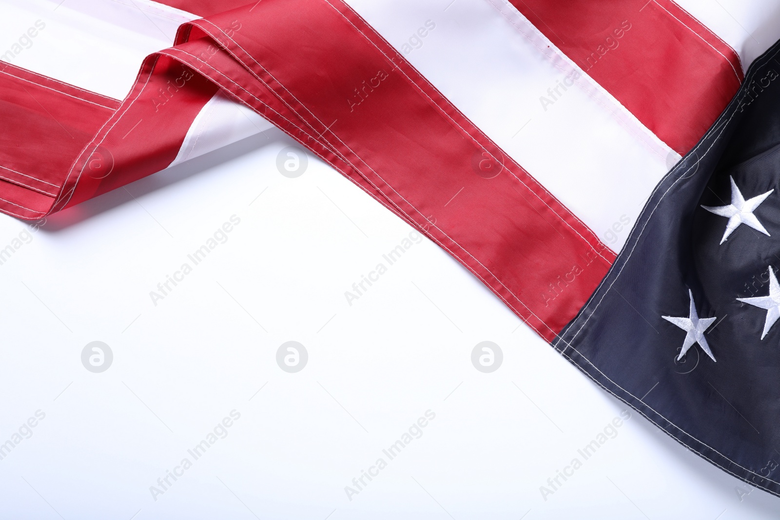 Photo of National flag of America isolated on white, top view