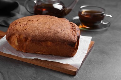 Photo of Fresh delicious cake served on grey table