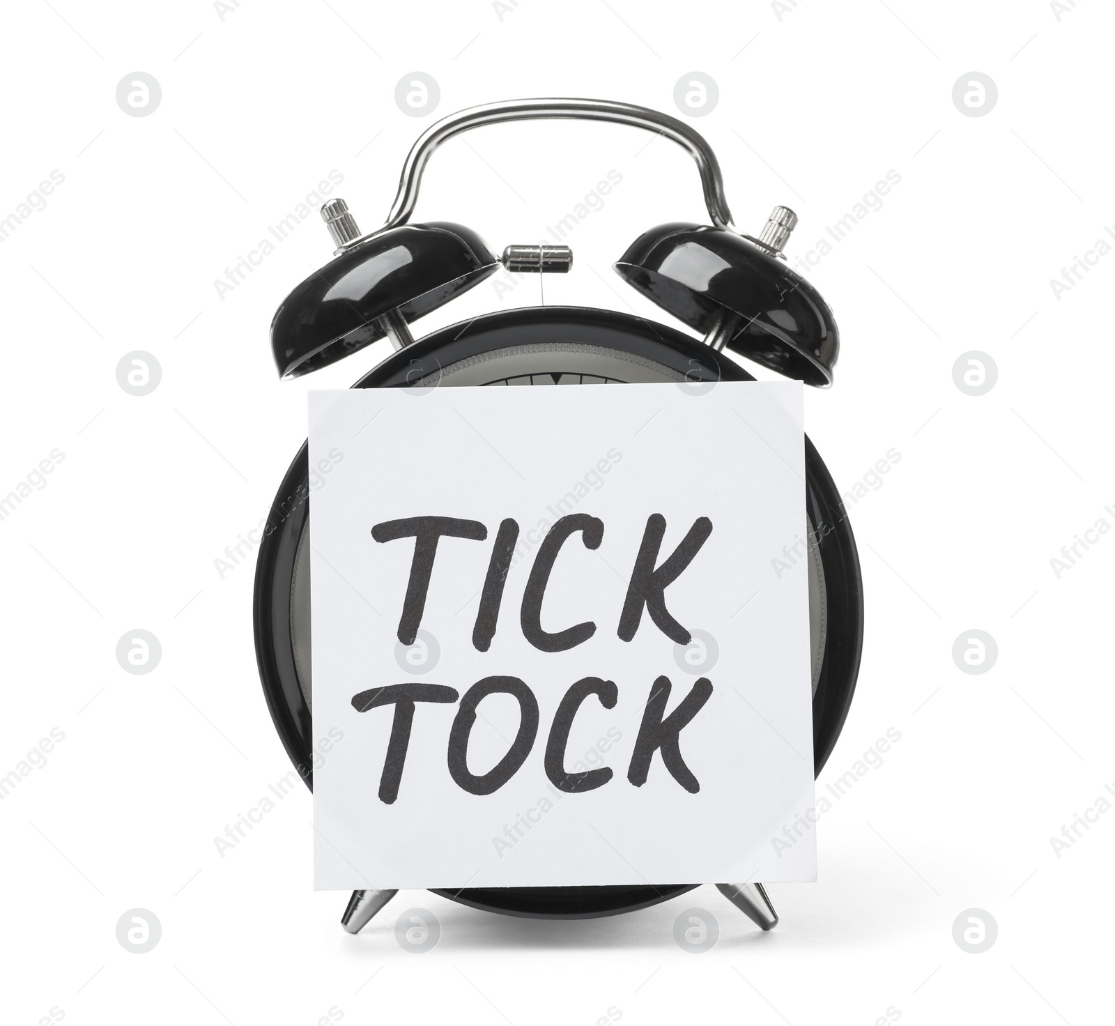 Photo of Alarm clock and sticky note with words TICK TOCK on white background. Time concept