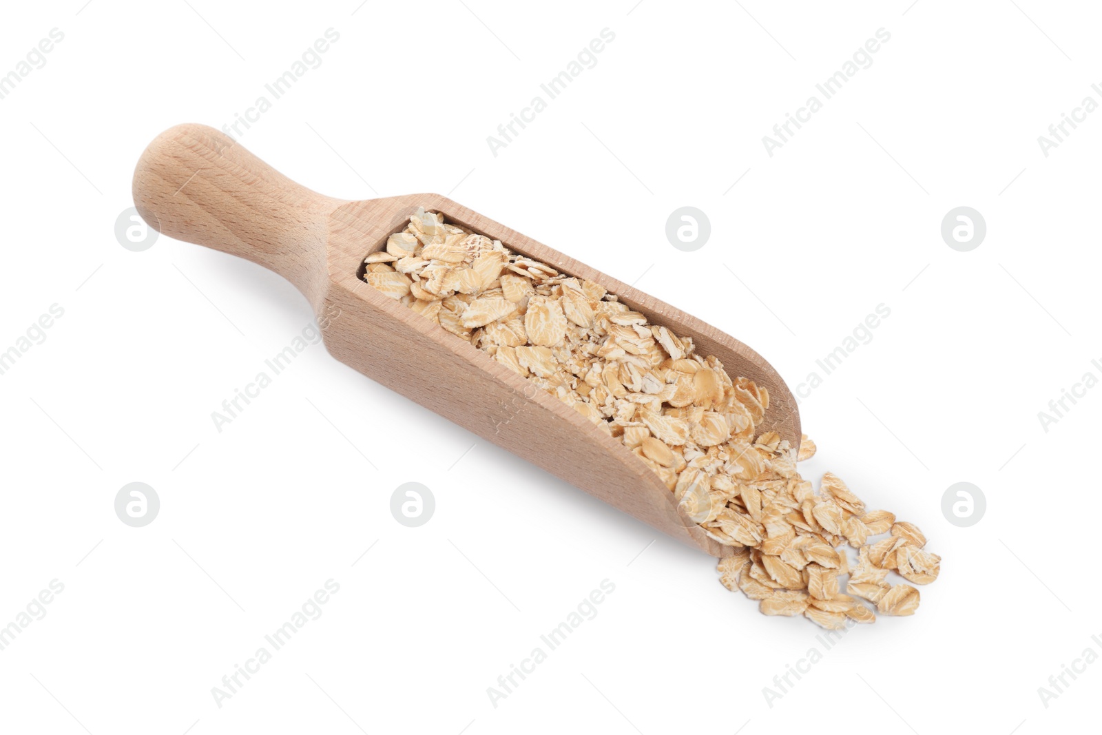Photo of Wooden scoop of oatmeal isolated on white