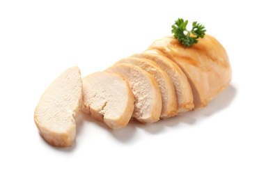 Photo of Partially cut fried chicken breast with parsley on white background