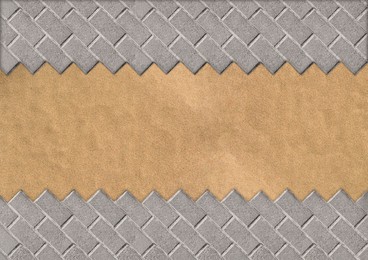 Image of Sand and grey tiles outdoors, top view