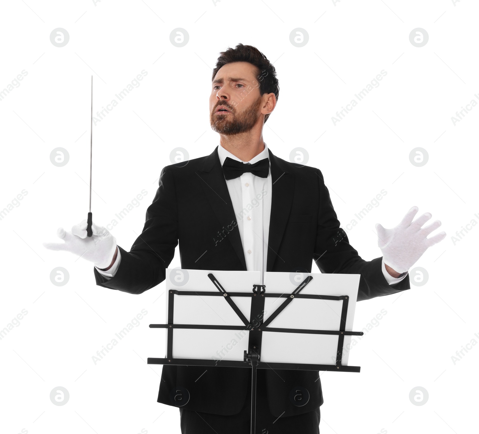 Photo of Professional conductor with baton and note stand on white background