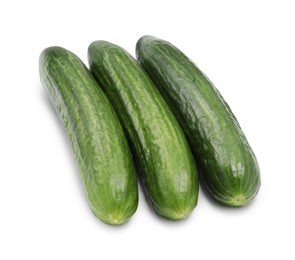 Photo of Many long fresh cucumbers isolated on white