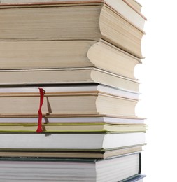 Stack of many different books isolated on white