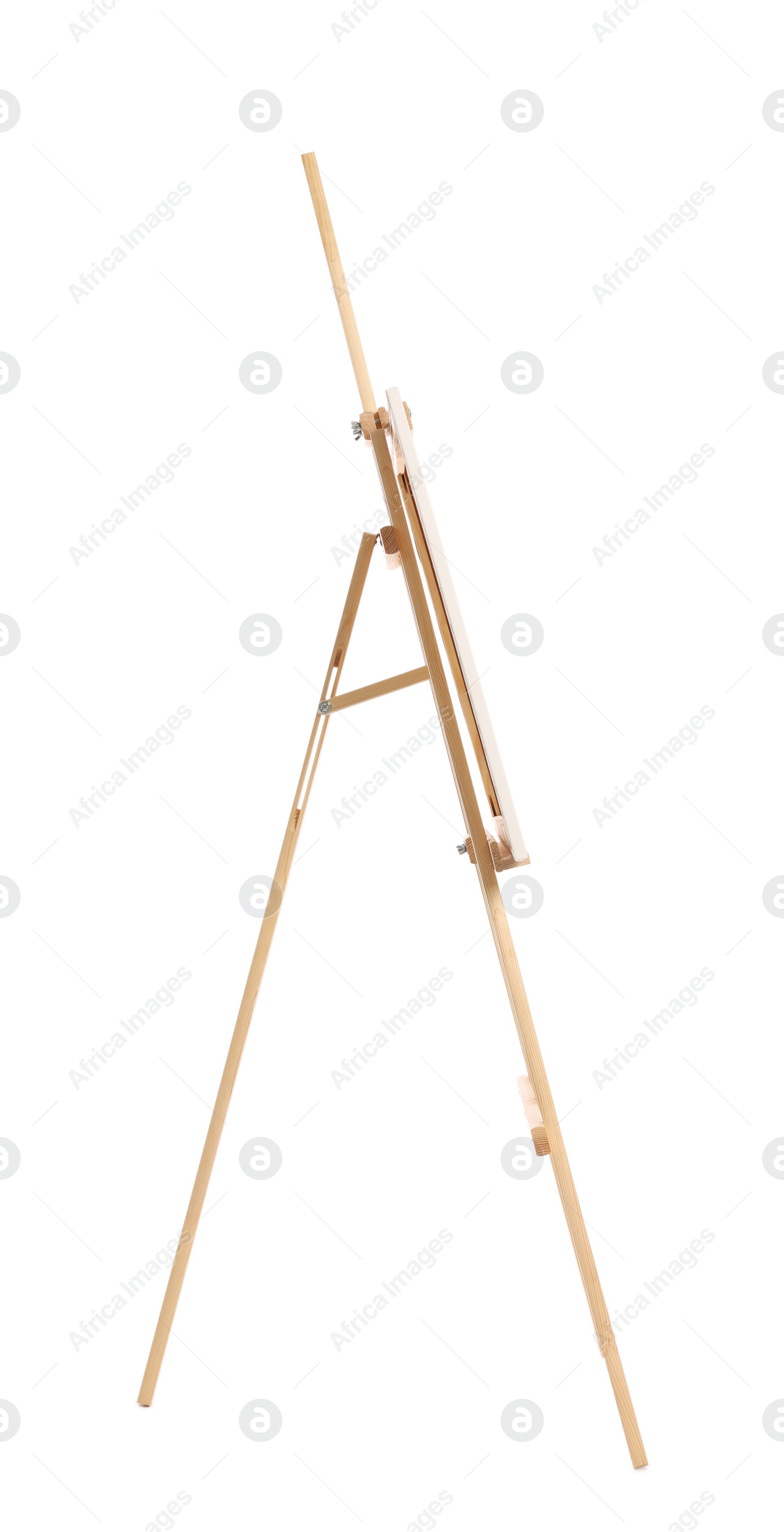 Photo of Wooden easel with canvas isolated on white