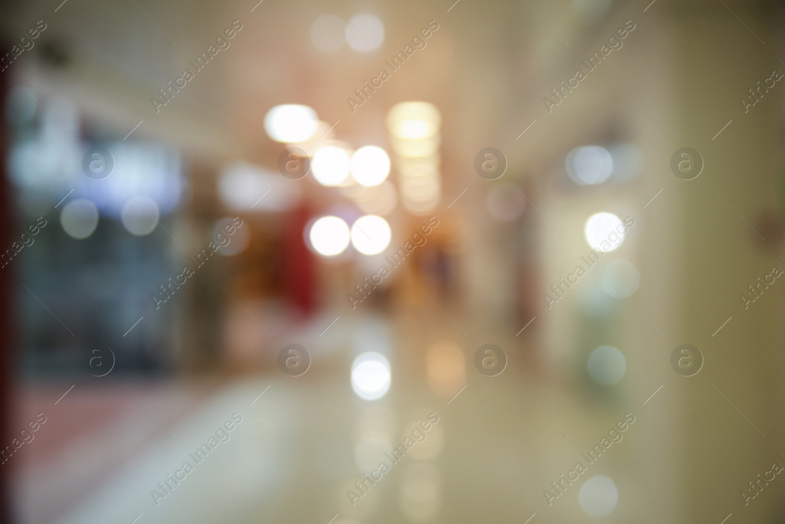 Photo of Blurred view of shopping mall entrance hall interior