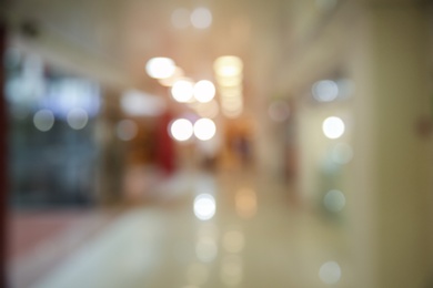 Blurred view of shopping mall entrance hall interior