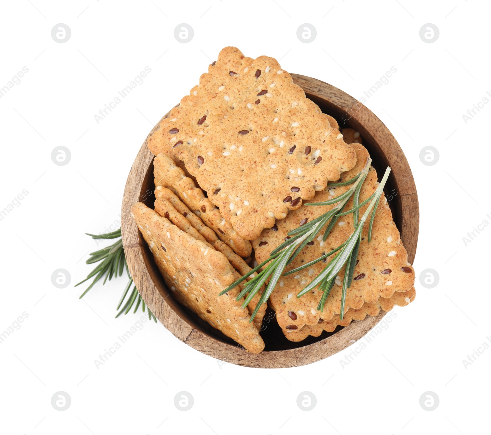 Photo of Cereal crackers with flax, sesame seeds and rosemary in bowl isolated on white, top view