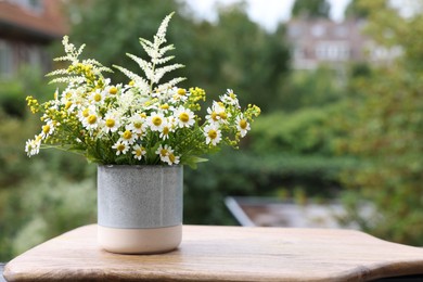 Bouquet of fresh flowers outdoors. Space for text