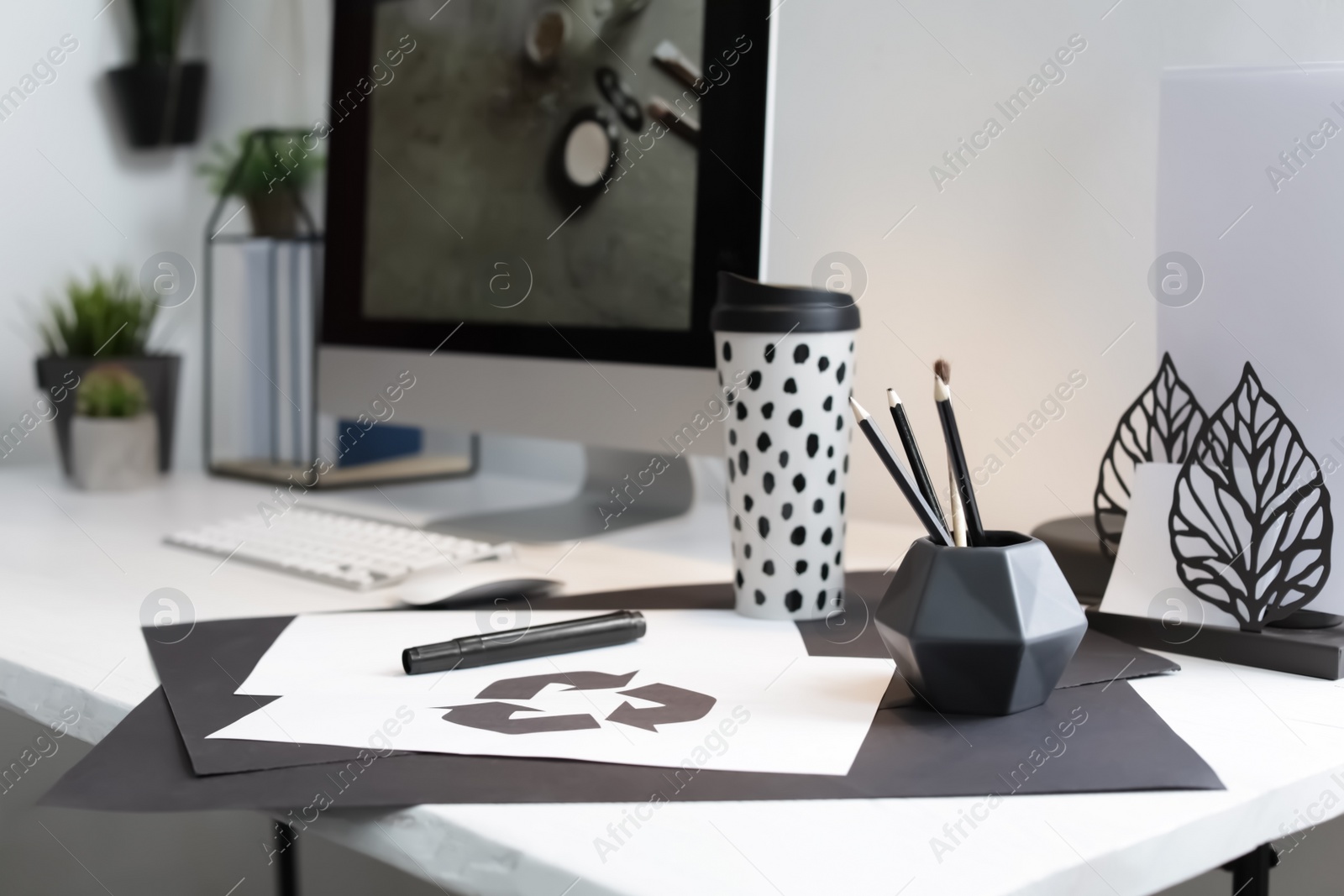 Photo of Stylish workplace with modern computer on desk