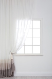 Modern window with curtain in room. Home interior