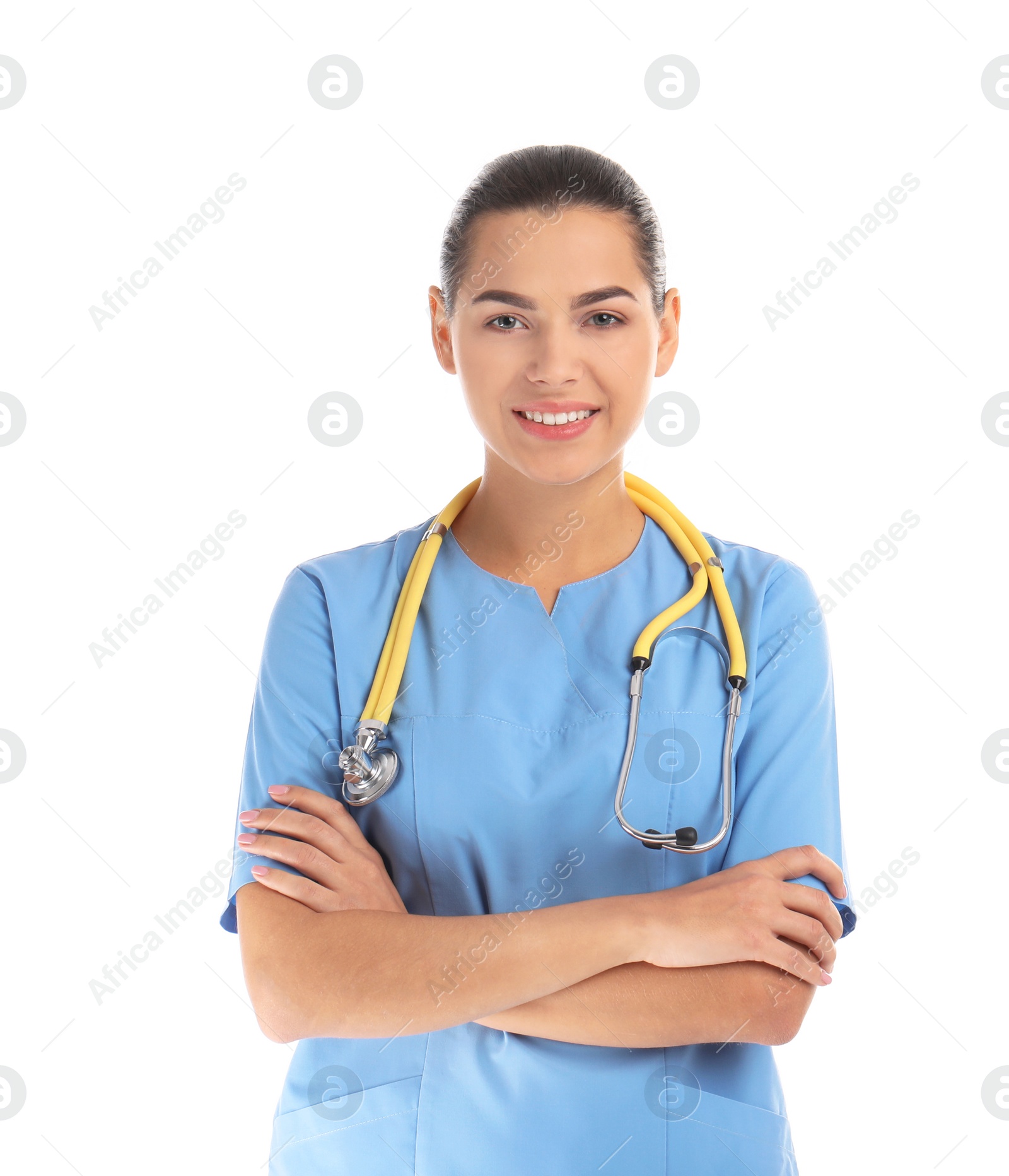 Photo of Portrait of young medical assistant with stethoscope on white background