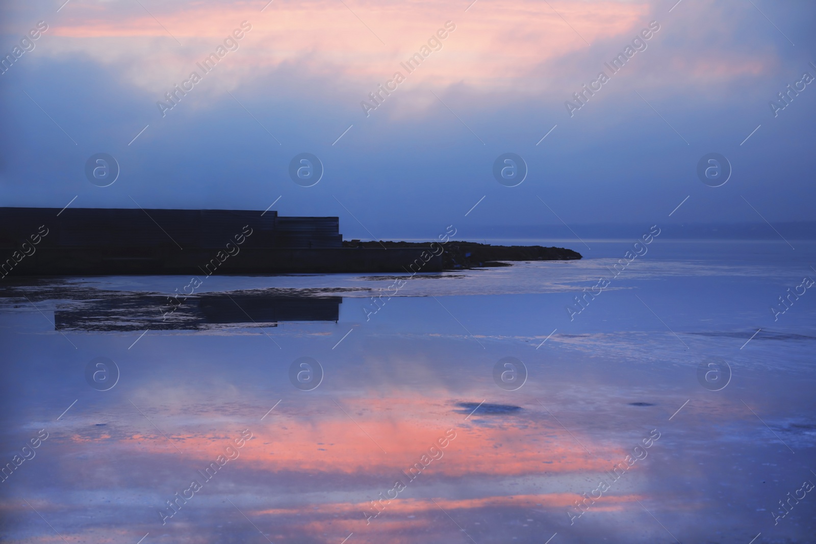 Photo of Picturesque view of beautiful sunset on riverside. Evening sky