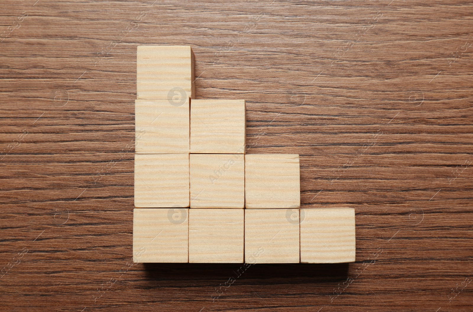 Photo of Blank cubes on wooden table, flat lay with space for text. Idea concept