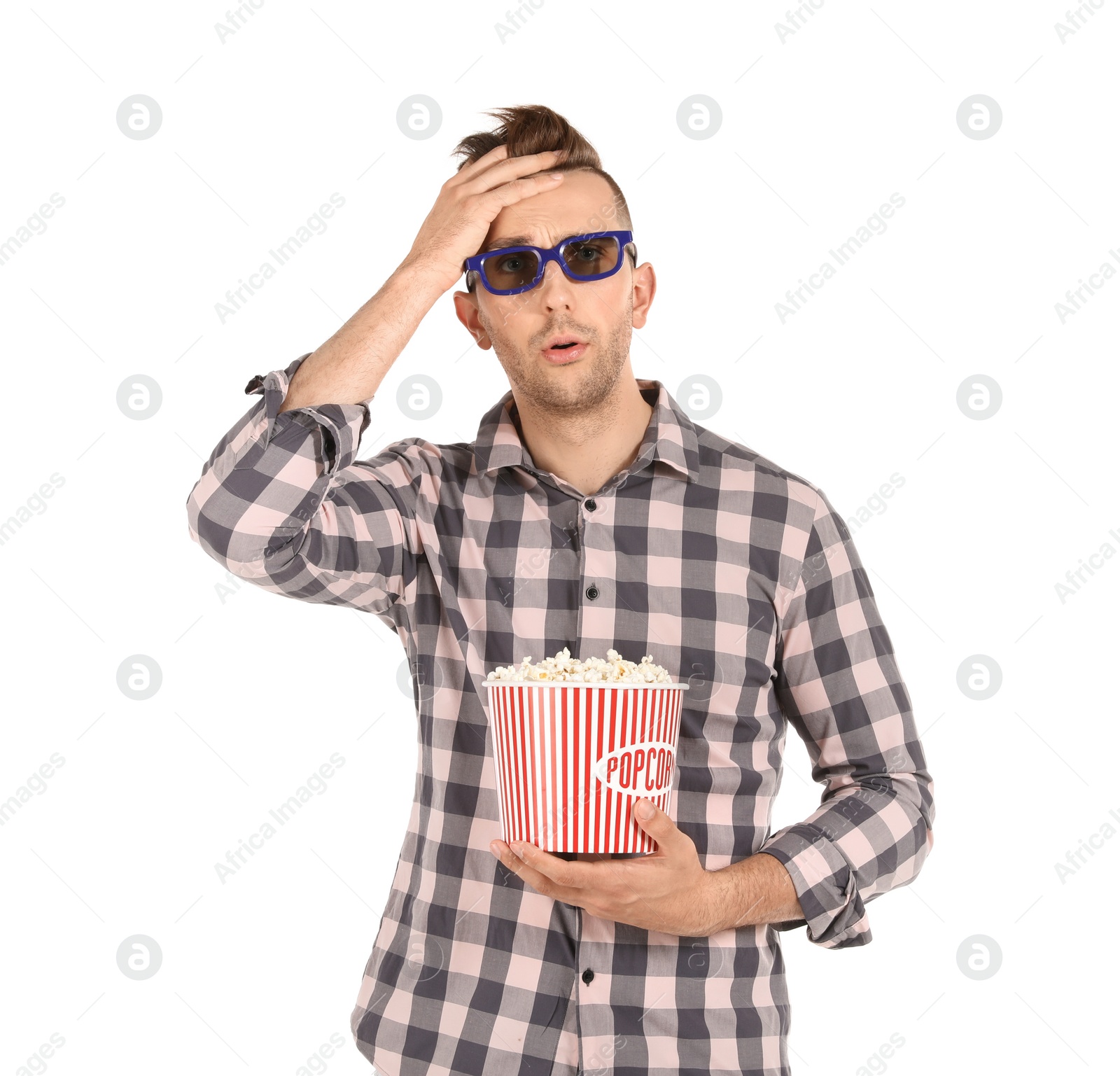 Photo of Emotional man with 3D glasses and popcorn during cinema show on white background