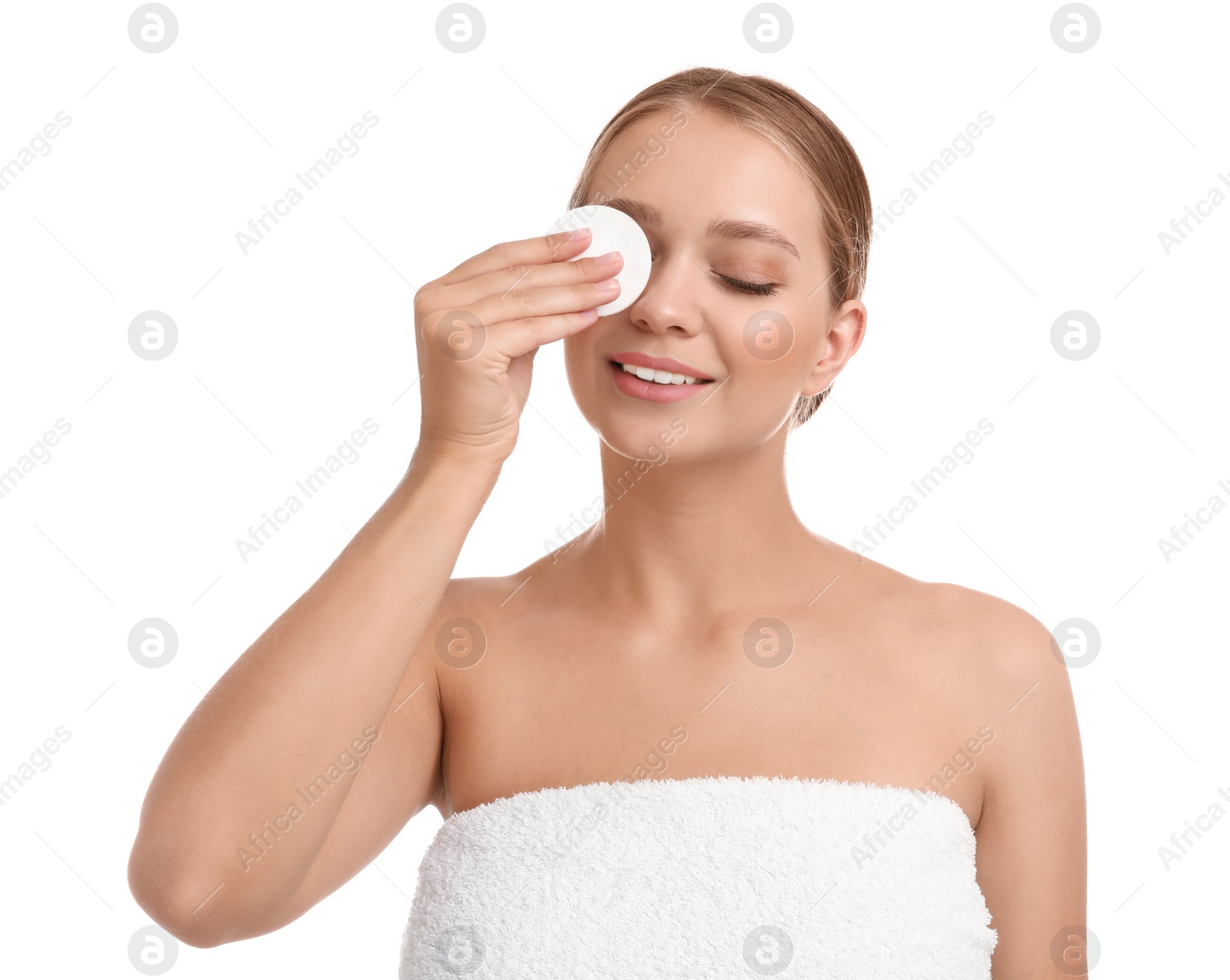 Photo of Beautiful young woman with cotton pad on white background