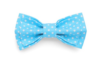 Stylish light blue bow tie with polka dot pattern on white background, top view