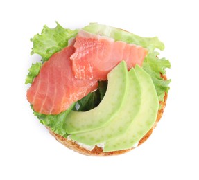 Photo of Tasty rusk with salmon, cream cheese and avocado isolated on white, top view