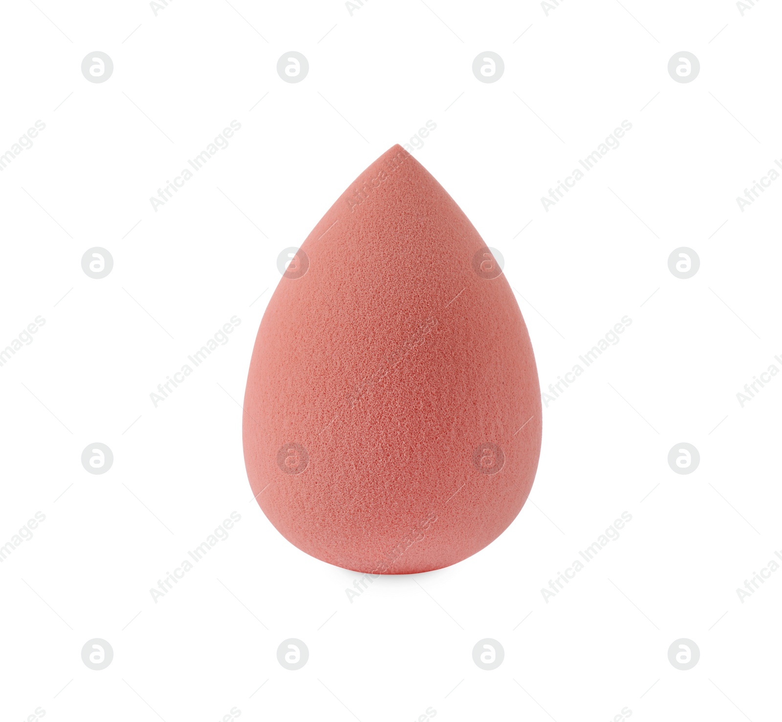 Photo of One coral makeup sponge isolated on white