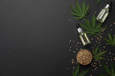 Photo of Flat lay composition with hemp leaves, CBD oil and THC tincture on black background, space for text