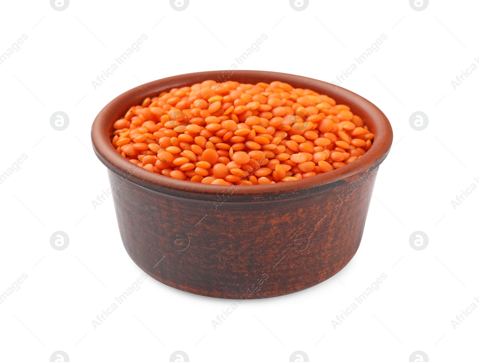 Photo of Raw red lentils in bowl isolated on white