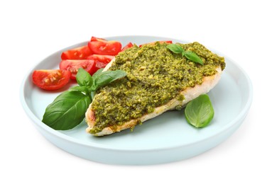 Delicious chicken breast with pesto sauce and basil isolated on white