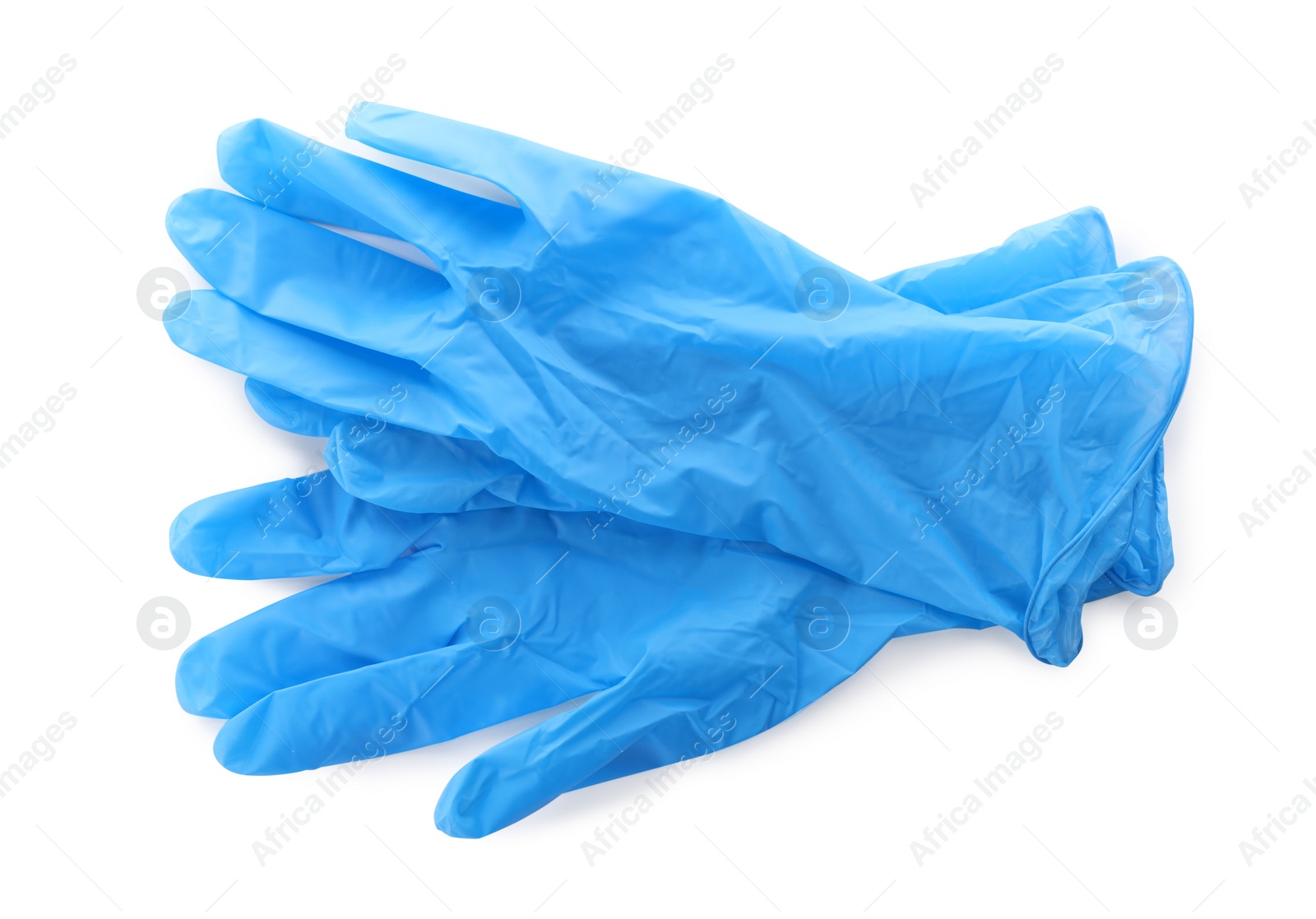 Photo of Medical gloves on white background, top view