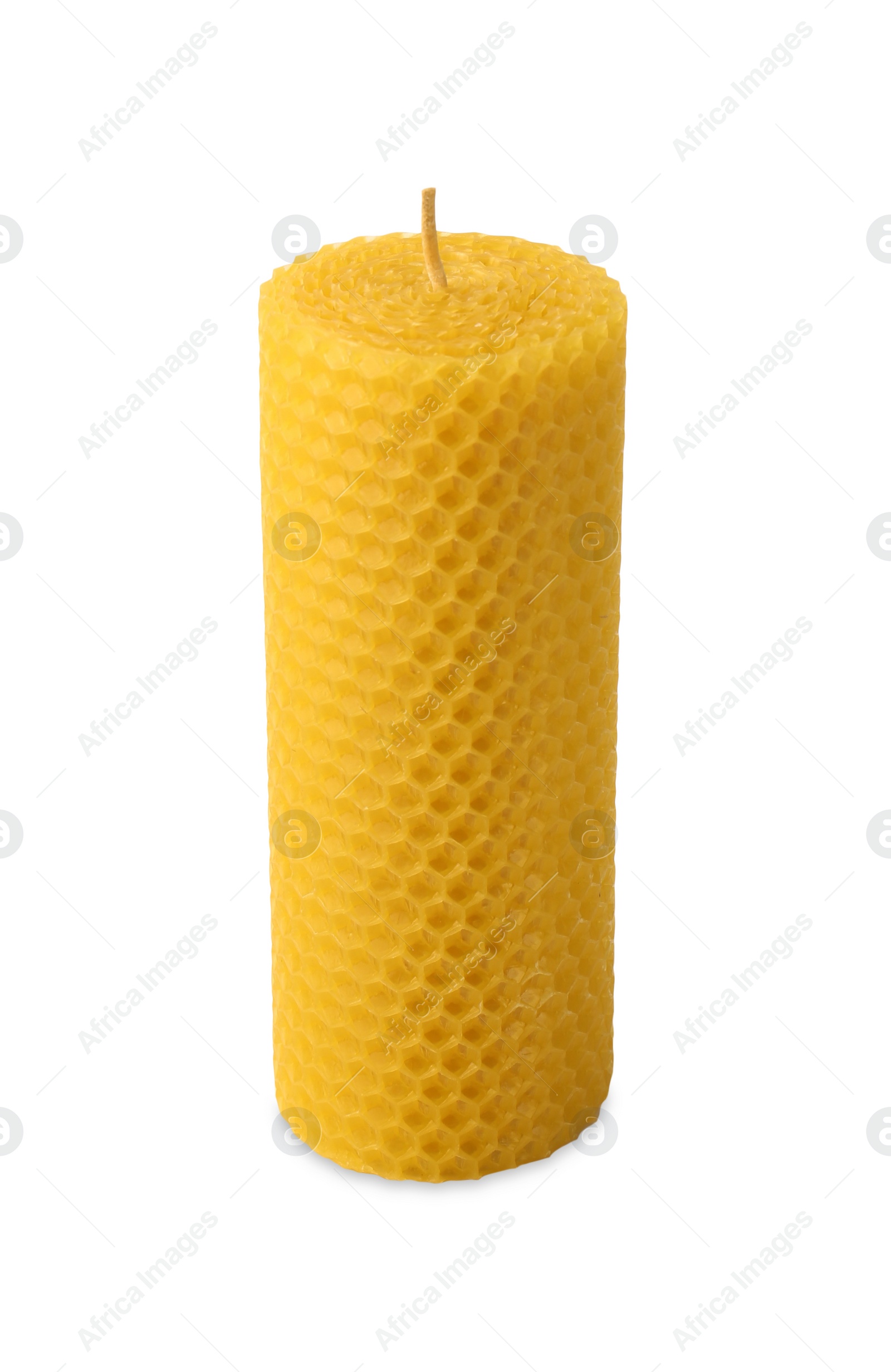Photo of Stylish elegant beeswax candle isolated on white