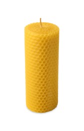 Stylish elegant beeswax candle isolated on white