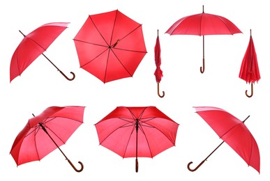 Image of Set with stylish red umbrellas on white background