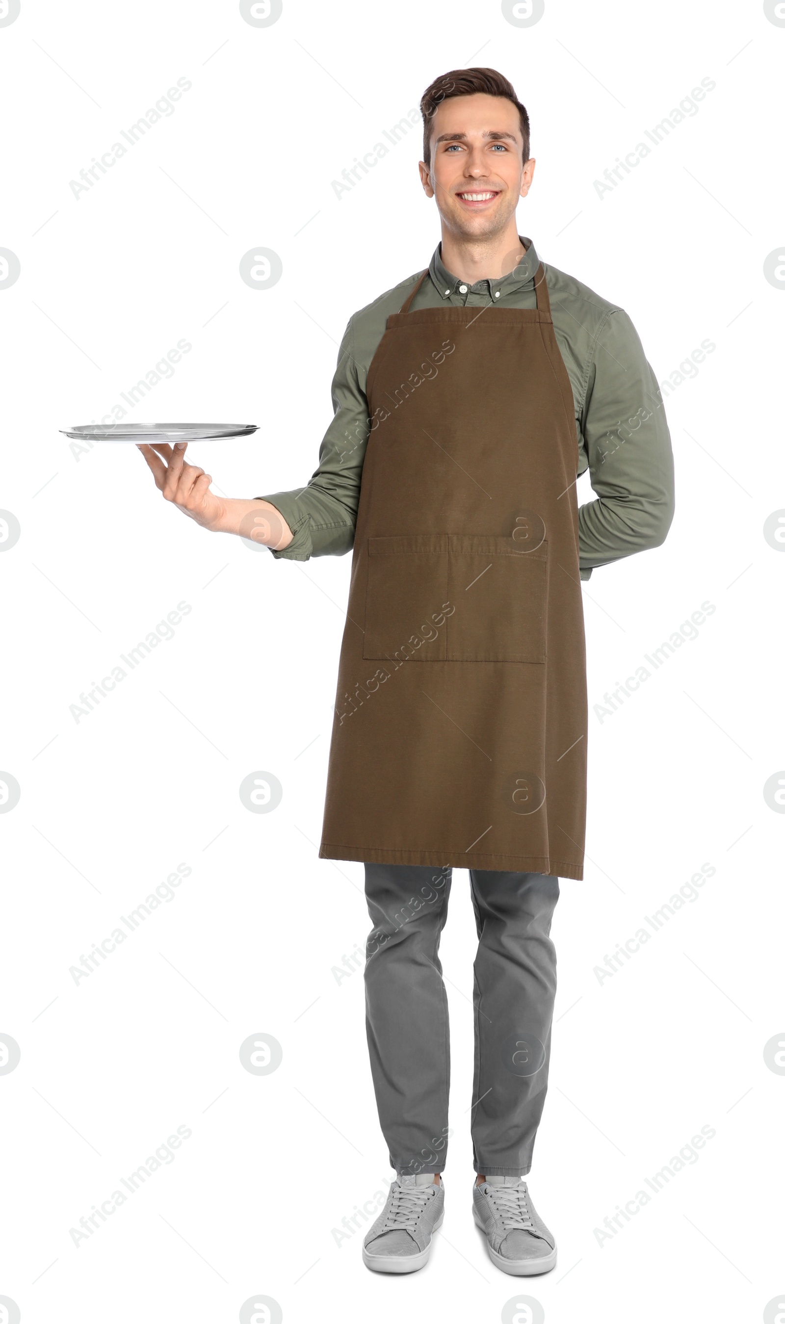 Photo of Handsome waiter with empty tray on white background