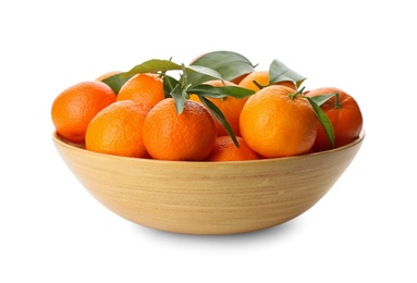 Fresh tangerines with green leaves in wooden bowl on white background