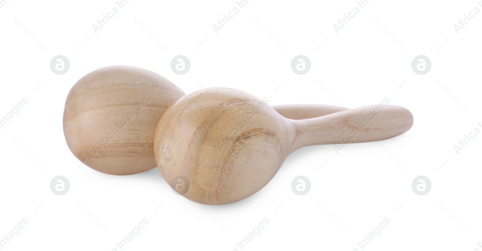 Photo of Wooden maracas isolated on white. Musical instrument