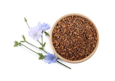 Bowl of chicory granules and flowers on white background, top view
