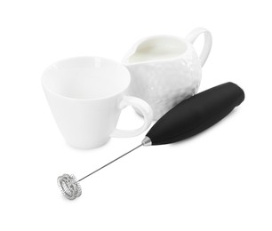 Milk frother wand, cup and pitcher isolated on white