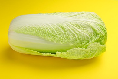 Fresh ripe Chinese cabbage on yellow background