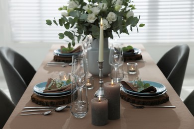 Festive table setting with beautiful tableware and decor indoors